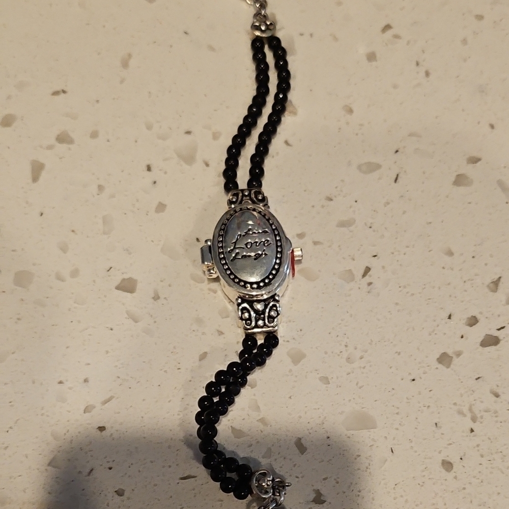 Geneva Black and Silver Women's Watch